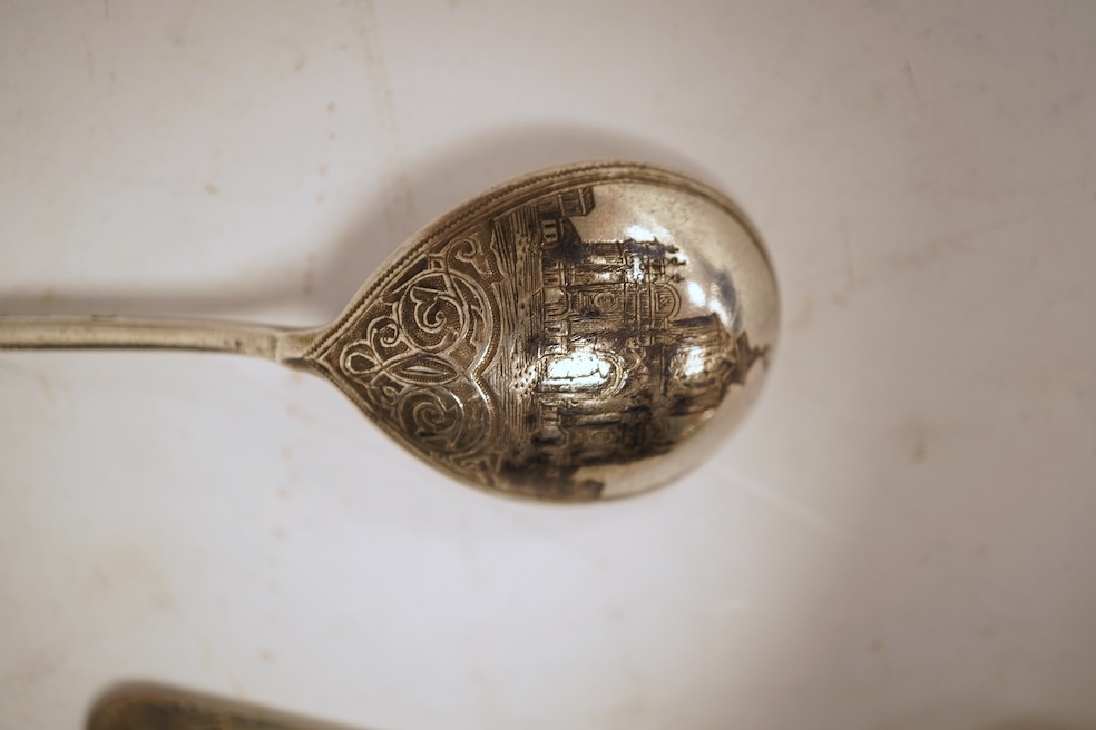 A small collection of nine assorted Georgian and later small silver or white metal spoons, including mustard ladles and other condiment spoons, a caddy spoon, London, 1799, together with a 19th century Russian 84 zolotni